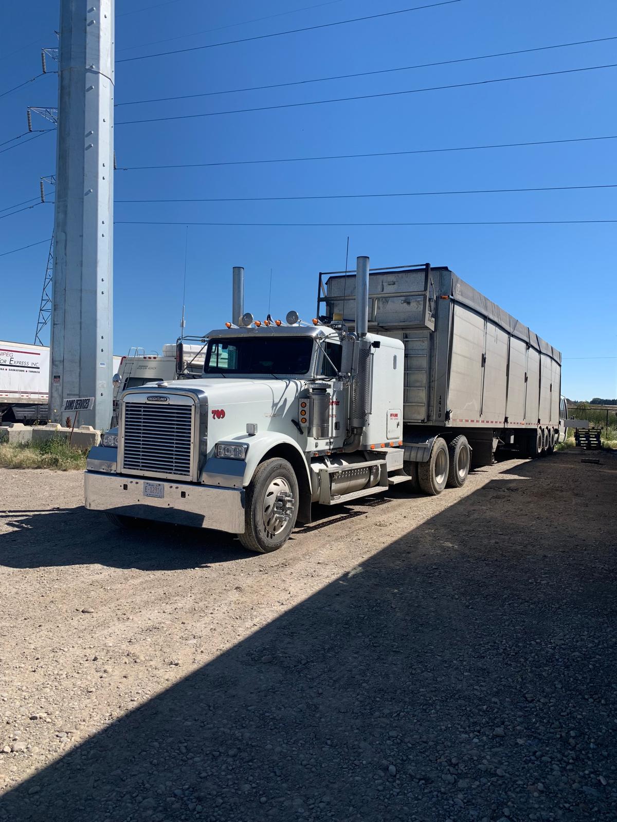 Sam’s Services truck and trailer in Calgary